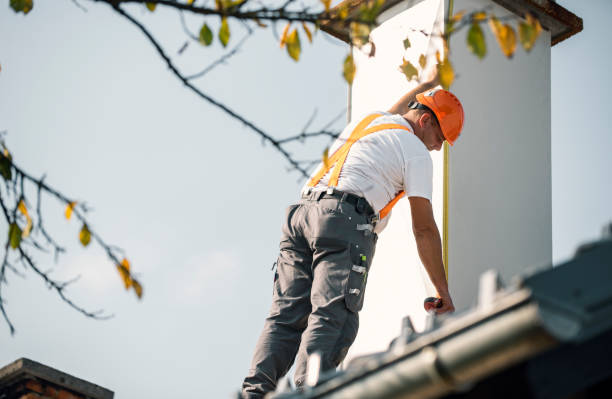 istock Roofer measuring chimney on roof top 1295220915