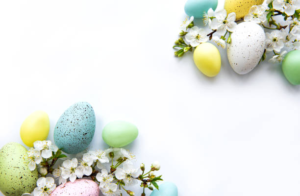 istock Colorful Easter eggs with spring blossom flowers 1295221383
