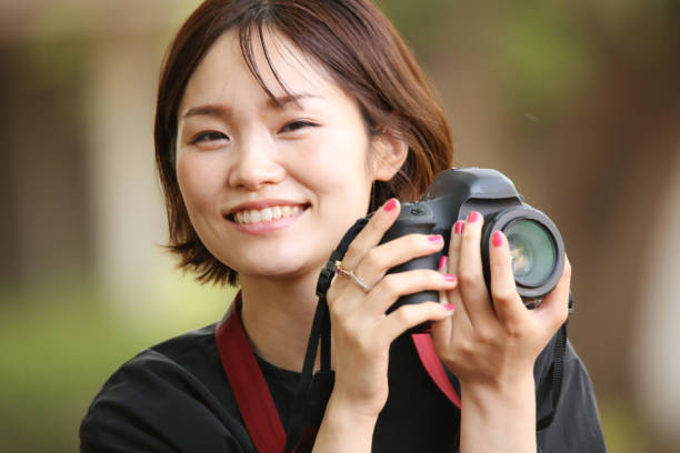 istock Woman taking a picture 1295222956