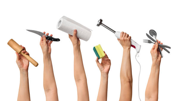 istock different kitchen equipment in the hands of people 1295224113