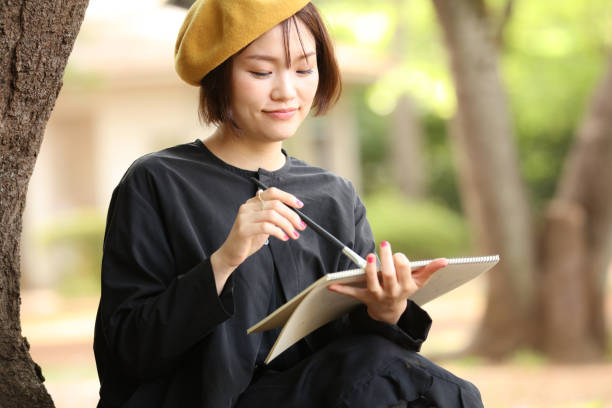 istock Woman drawing a picture 1295225206