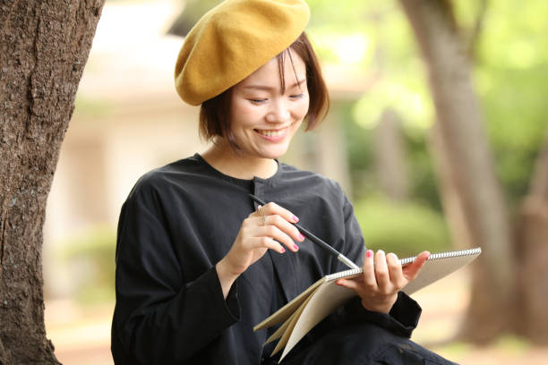 istock Woman drawing a picture 1295225227