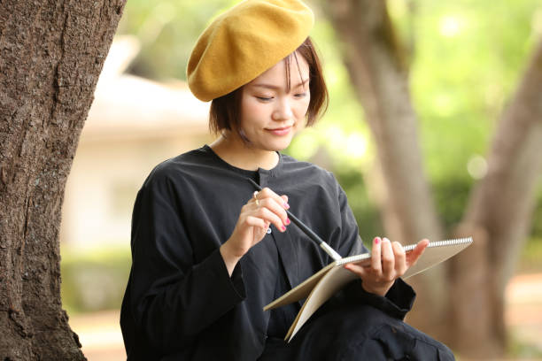 istock Woman drawing a picture 1295225314