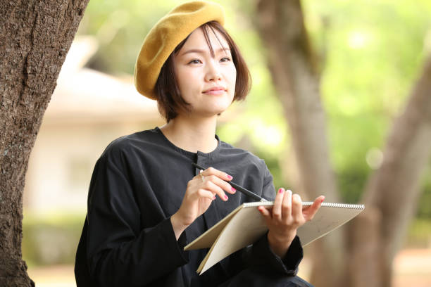 istock Woman drawing a picture 1295225842