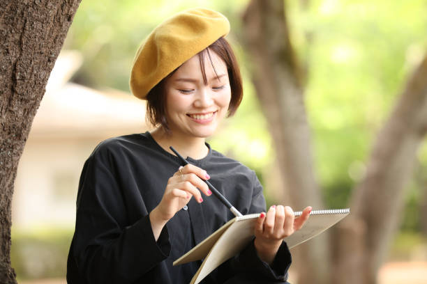 istock Woman drawing a picture 1295225883