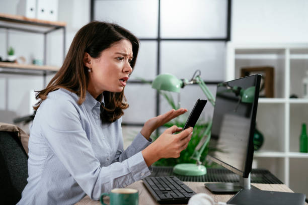 istock Businesswoman using the phone in office. 1295230078