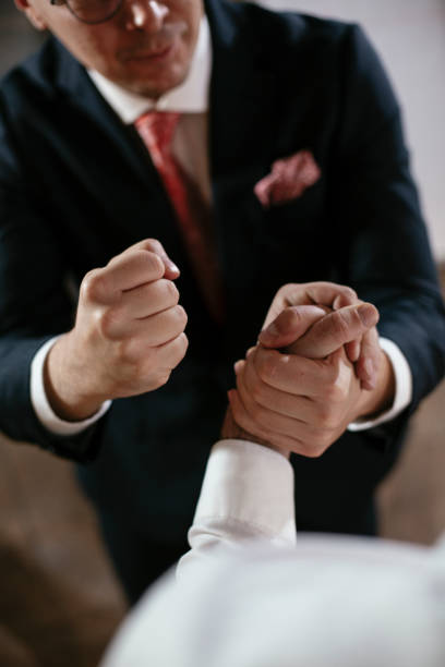 istock Close up of men handshake in office 1295234885