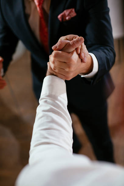 istock Close up of men handshake in office 1295234892