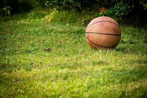 Basketball for recreation activities in a countryside area. Use for fitness and healthy lifestyle concept. Sporting activity use.