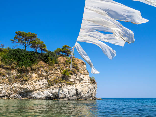 Snorkeling Small island Agios Sostis (Cameo) in Zakynthos island, Greece.