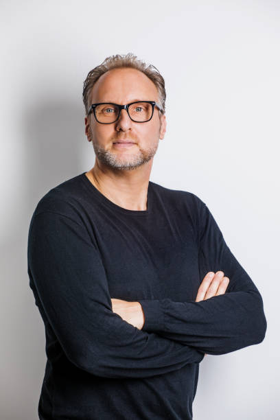 istock Portrait of a handsome caucasian man in posed studio shot 1295242815