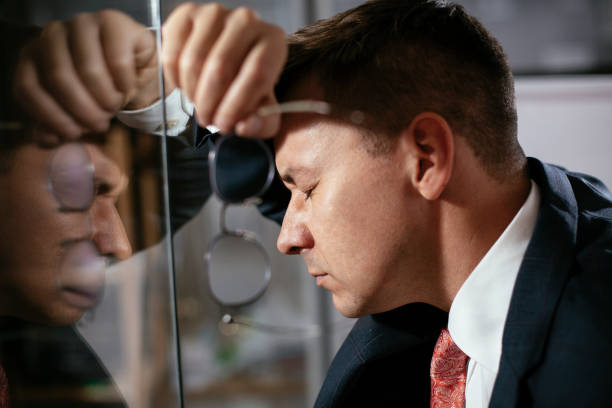 istock Tired businessman making a business plan. 1295244059