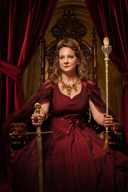 istock Historical Queen character on the throne 1295245225