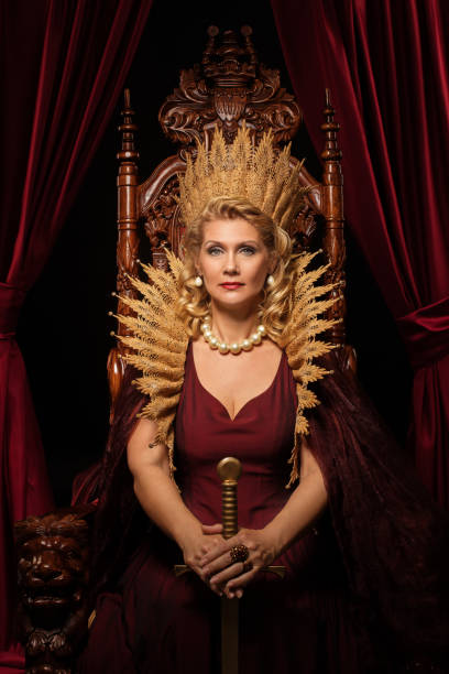 istock Historical Queen character on the throne 1295246196