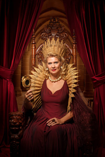 istock Historical Queen character on the throne 1295246318