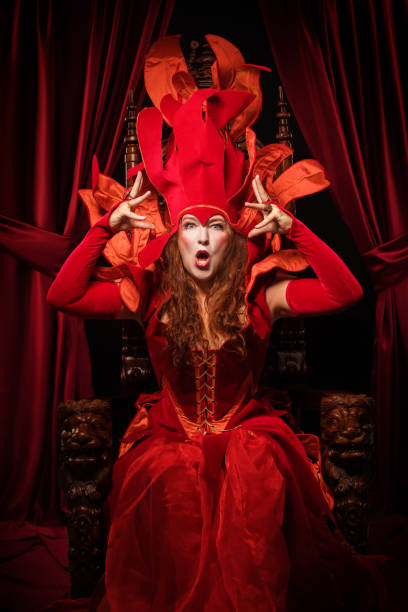 istock Queen of Fire type character on the throne 1295246600