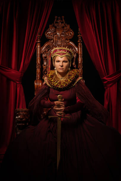 istock Historical Queen character on the throne 1295247084