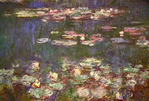 Closeup photo of a section of the Impressionist painter Claude Monet’s Waterlily paintings in the Musee de l’Orangerie in Paris