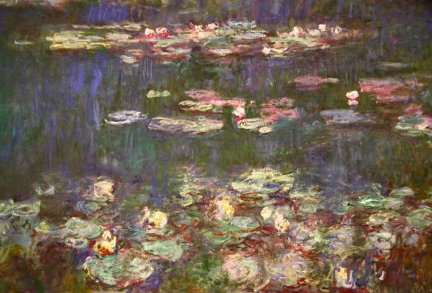 Waterlily Paintings Closeup photo of a section of the Impressionist painter Claude Monet’s Waterlily paintings in the Musee de l’Orangerie in Paris claude monet photos stock pictures, royalty-free photos & images