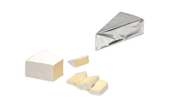 istock Sliced Brie cheese isolated on white background 1295249031