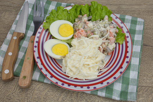 macedonia of vegetables hard-boiled eggs green salad and celery
