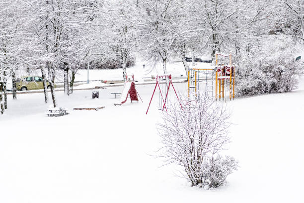 istock Wonderful white winter landscape with playground 1295251949