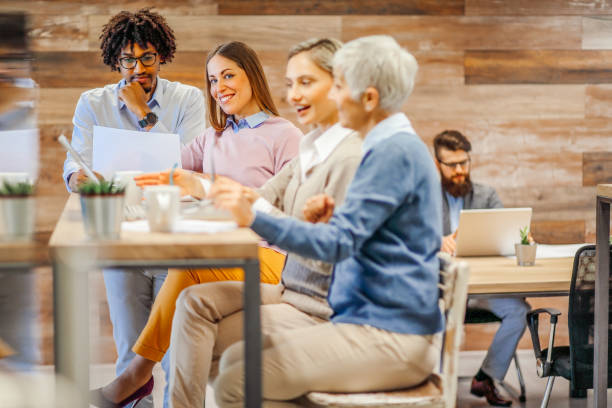 istock Modern business. Colleagues having a coffee break. 1295252423