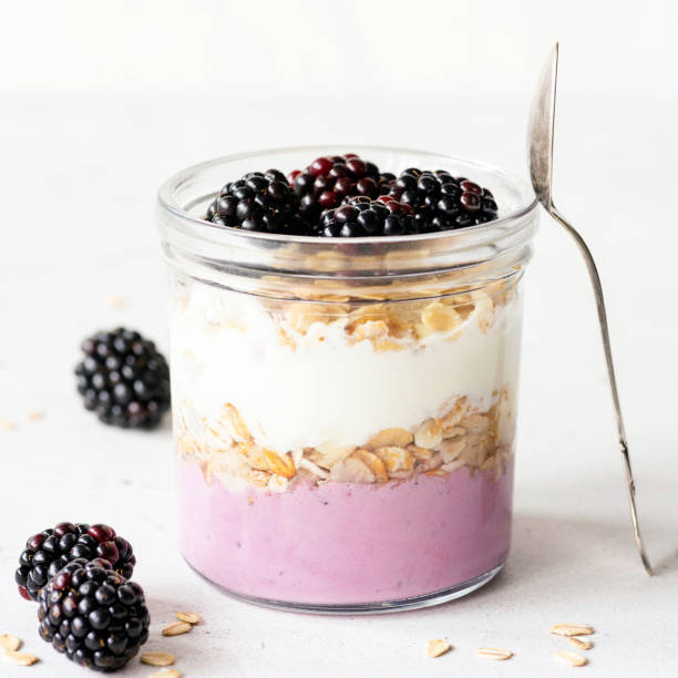 istock Yogurt with oats and blackberries 1295254912
