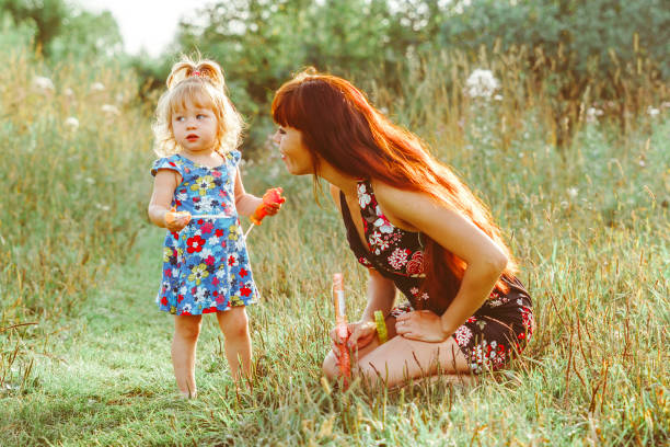istock mother holds baby in her arms 1295254971