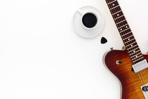 istock Musician work set with guitar, note and headphones 1295257354