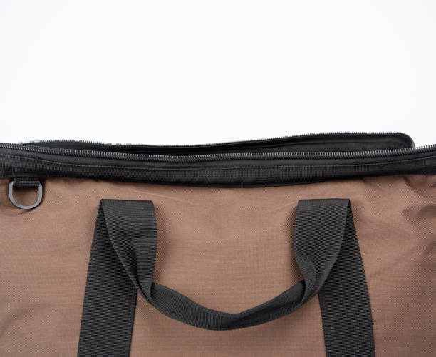 istock open brown textile travel bag with handles 1295259461
