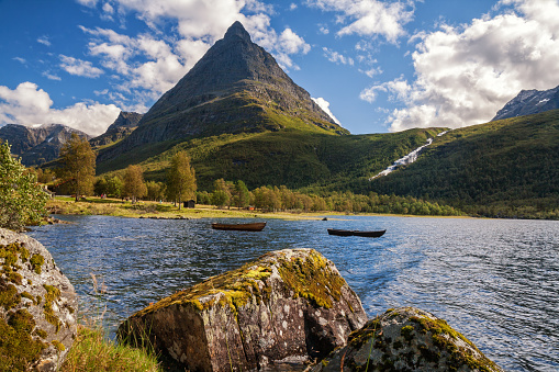 Innerdalen National Park in Norway. Summer landscape with Innerdalsvatna Lake and the mountain peak of Innerdalstarnet
