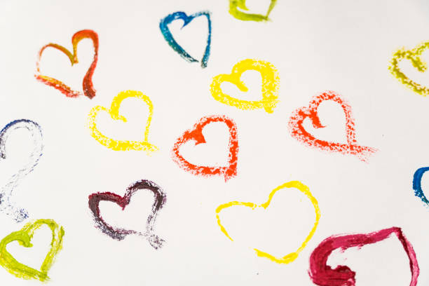 istock Valentine's Day card made from hearts painted with paints on a white background. 1295264738