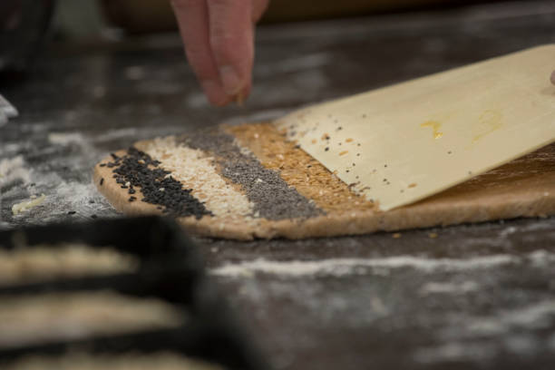 istock woman baking bread in the kitchen 1295264853