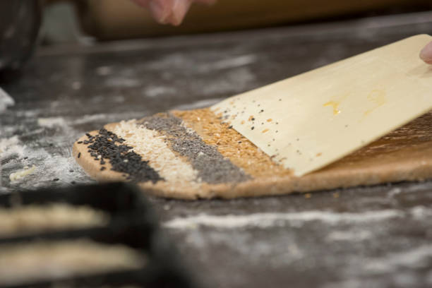 istock woman baking bread in the kitchen 1295264896