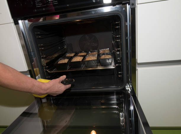 istock baking fresh bread loafs in the oven 1295264897