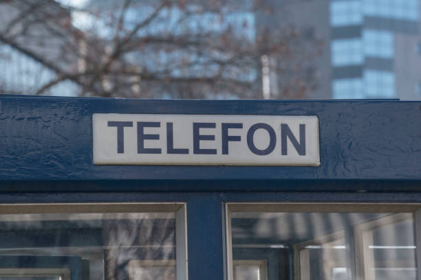 Telephone (Telefon) sign on the blue door of a phone booth