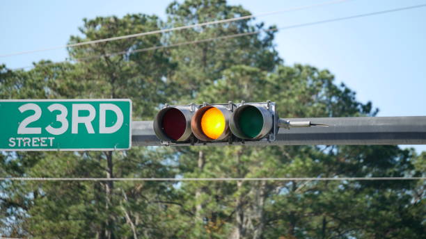 istock Yellow light at an intersection - North American traffic light 1295276811
