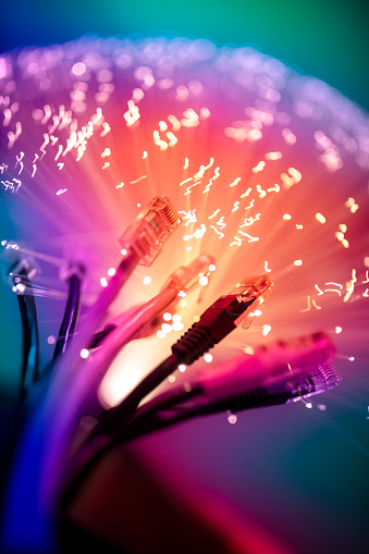 Fiber optics and network rj45 plug abstract background