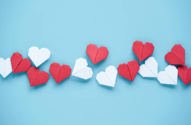 istock Valentine’s Day concept, Red and white heart on blue background. 1295284013