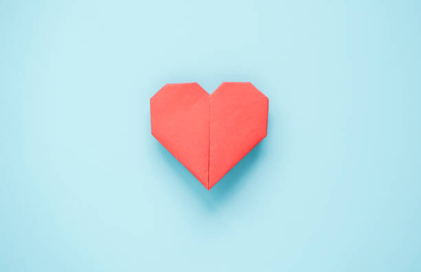 istock Valentine’s Day concept, Red heart on blue background. 1295284328