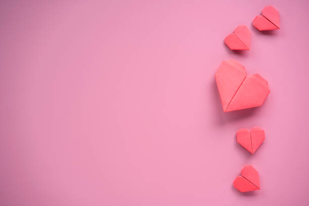 istock Valentine’s Day concept, Red heart on pink background. 1295286609