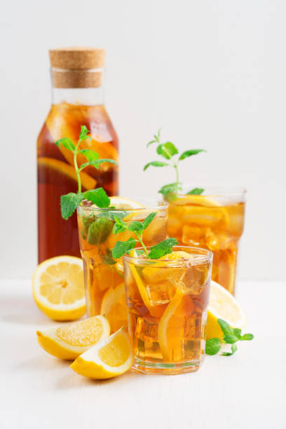 istock Iced tea with lemon slices, mint and ice 1295287001