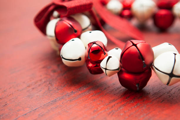 Close-up of Christmas decoration - red and white coloured bells in a wreath