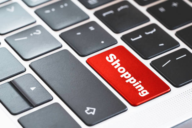istock Online shopping concept, shopping on red button of laptop keyboard computer. 1295295586