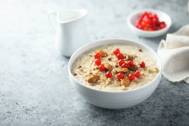 istock Oatmeal porridge with berries 1295297579