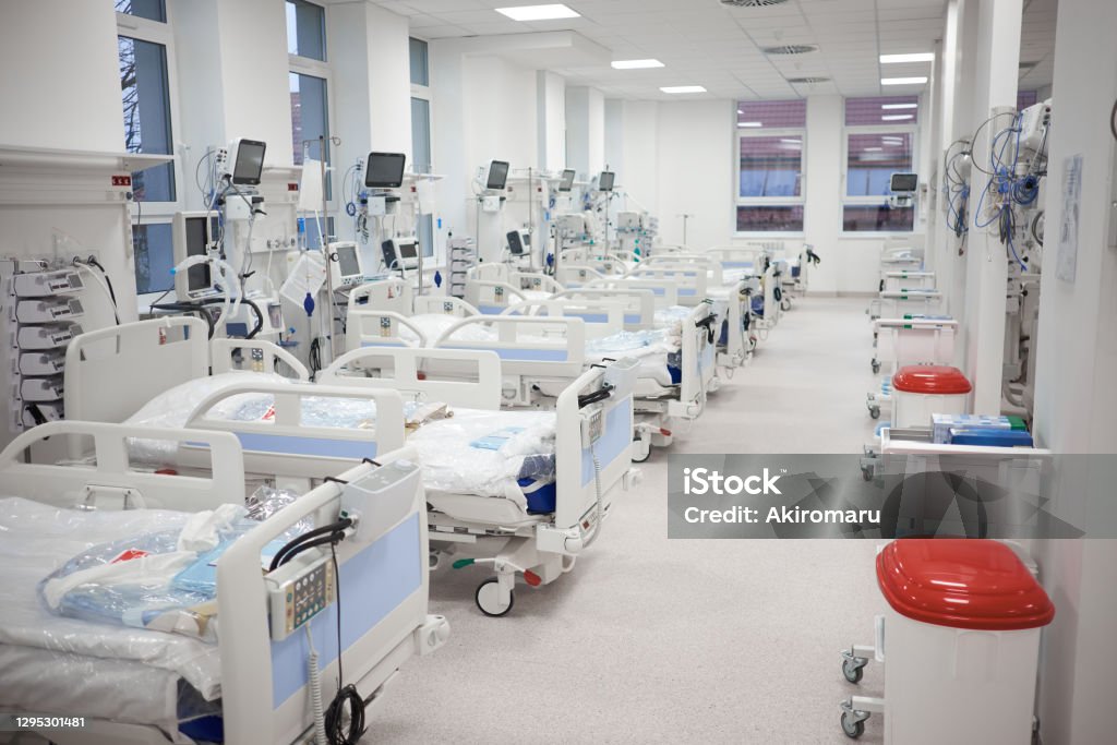 Modern empty temporary intensive care emergency room is ready to receive patients with coronavirus infection. Hospital Stock Photo