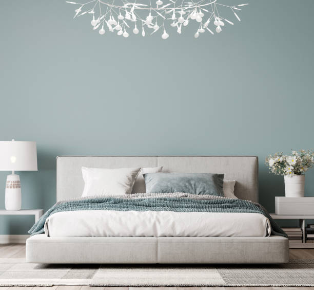 istock Luxury bright bedroom design, modern white bed and elegant home accessories 1295301836