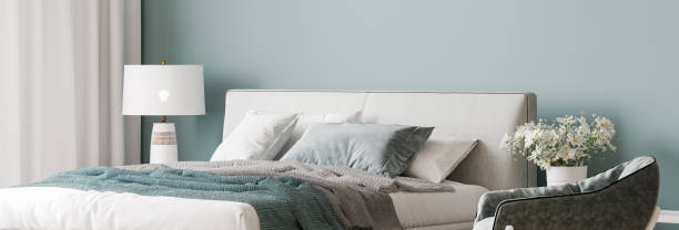 istock Luxury bright bedroom design, modern white bed and elegant home accessories 1295301837