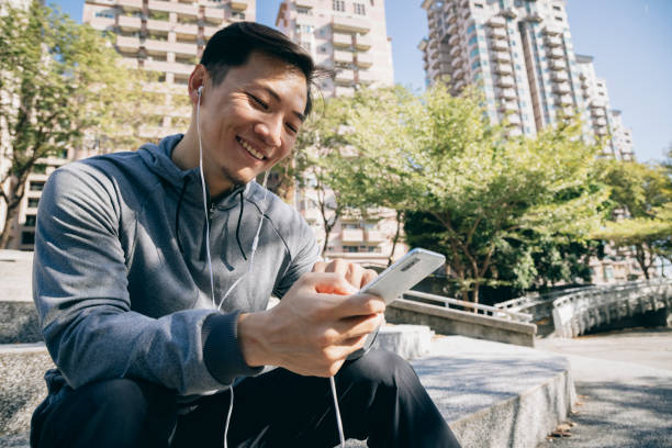 istock male runner resting portrait 1295301998